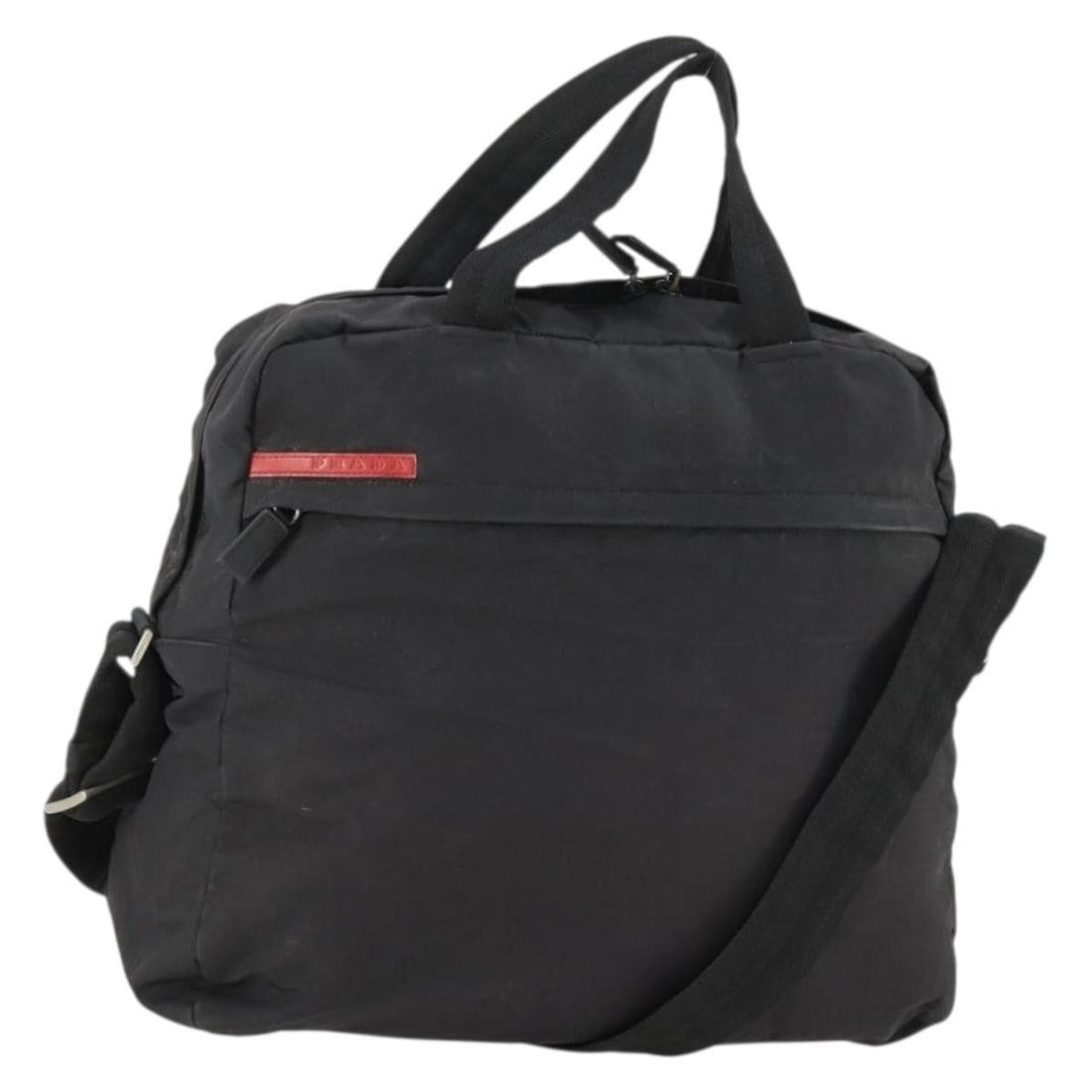 Black Silver Nylon PRADA 2-Way Shoulder Handbag Made in Italy: Black Silver Nylon PRADA 2-Way Shoulder Handbag Made in Italy This Prada sports handbag features a nylon exterior in black with silver accents. Designed as a versatile 2-way bag, it offers both handle