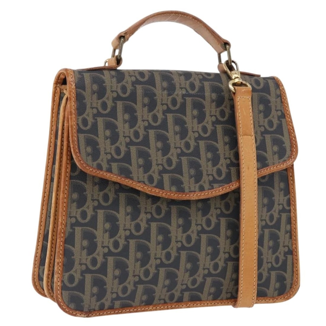 Christian Dior Trotter 2way Handbag in Navy PVC Canvas with Strap: Christian Dior Trotter 2way Handbag in Navy PVC Canvas with Strap A Christian Dior Trotter canvas PVC leather handbag in navy and gold, featuring a 2-way design and a shoulder strap accessory. Made in