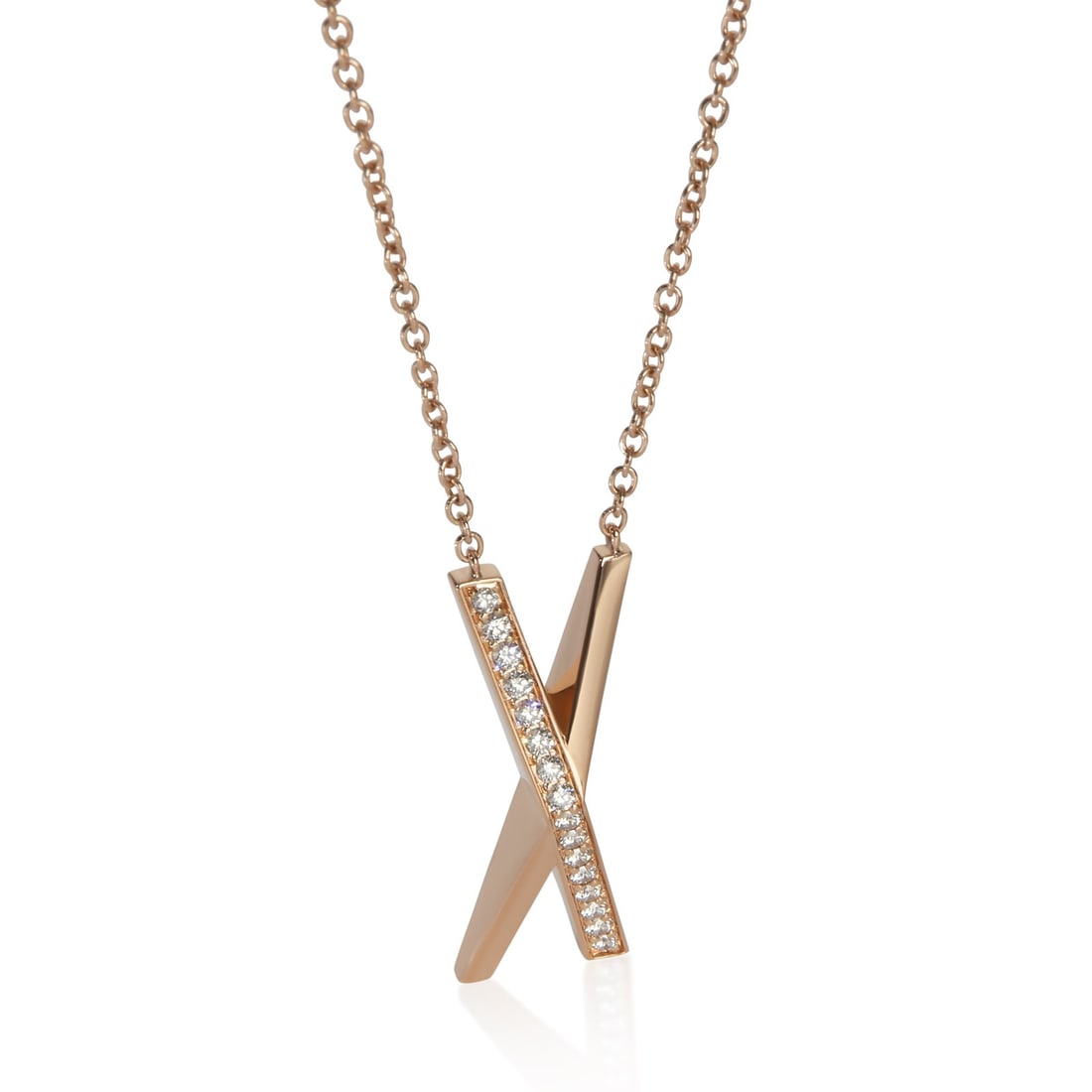 Tiffany & Co. Atlas X 18k Rose Gold Diamond Pendant: Tiffany & Co. Atlas X 18k Rose Gold Diamond Pendant This Tiffany & Co. Atlas X pendant features a round brilliant diamond set in 18k rose gold. The pendant is designed for women and showcases a lobste