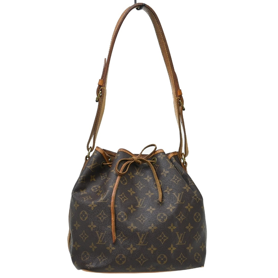Louis Vuitton Petit Noe Monogram Canvas Shoulder Bag M42226: Louis Vuitton Petit Noe Monogram Canvas Shoulder Bag M42226 Vintage Louis Vuitton Petit Noe shoulder bag in brown monogram canvas with leather trim and a drawstring closure. This unisex medium bag fea