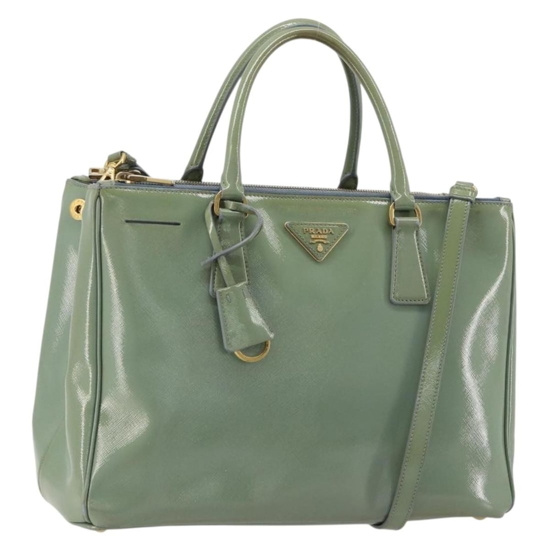 PRADA Galleria Saffiano Leather 2 Way Handbag Green with Strap: PRADA Galleria Saffiano Leather 2 Way Handbag Green with Strap PRADA Galleria hand bag in Saffiano leather with a green and gold color scheme. It is a 2-way style and comes with a clochette and should