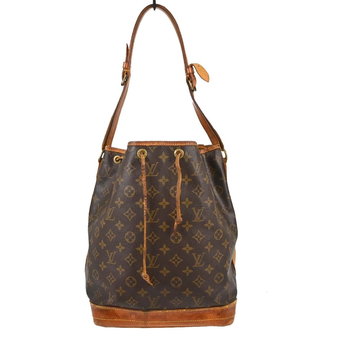 Louis Vuitton Noe Monogram Canvas Shoulder Bag M42224: Louis Vuitton Noe Monogram Canvas Shoulder Bag M42224 Vintage Louis Vuitton Noe shoulder bag in brown monogram canvas and leather with a drawstring closure and beige shoulder strap. Made in France, th