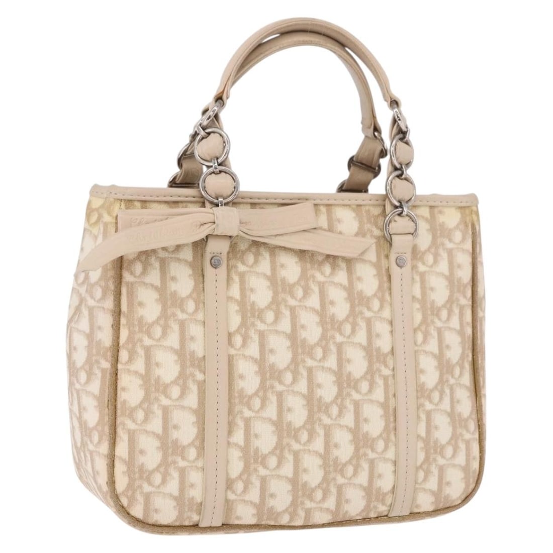 Christian Dior Romantic Trotter Hand Bag Beige PVC Canvas: Christian Dior Romantic Trotter Hand Bag Beige PVC Canvas A Christian Dior Trotter canvas romantic handbag in beige and silver, made from PVC leather and Trotter canvas. This handbag includes a Guaran