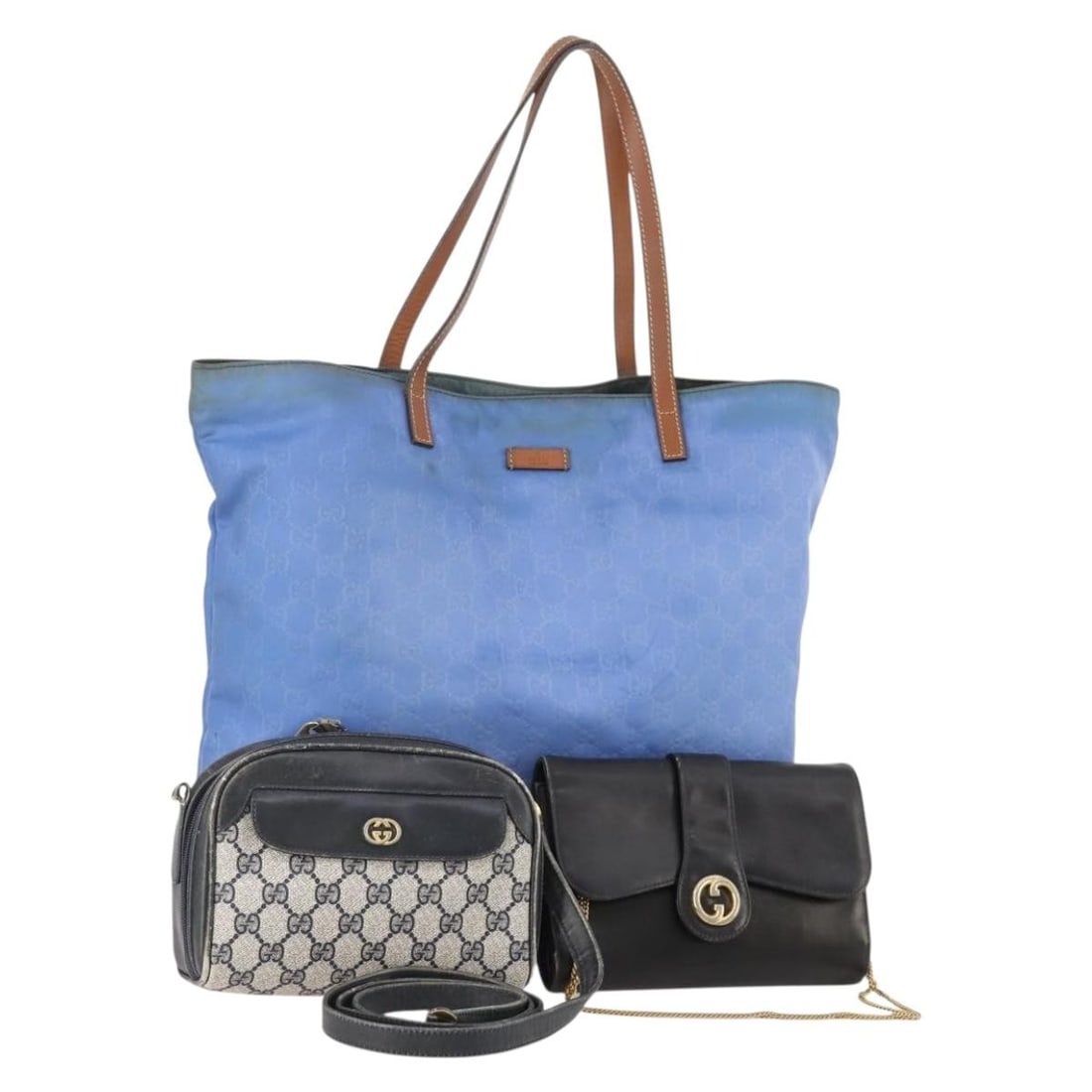 GUCCI tote bag 3 piece set in GG Supreme canvas and PVC leather: GUCCI tote bag 3 piece set in GG Supreme canvas and PVC leather Set of three Gucci GG Canvas GG Supreme tote bags in navy, blue, and black PVC leather and nylon. Made in Italy, this women's bag set sh