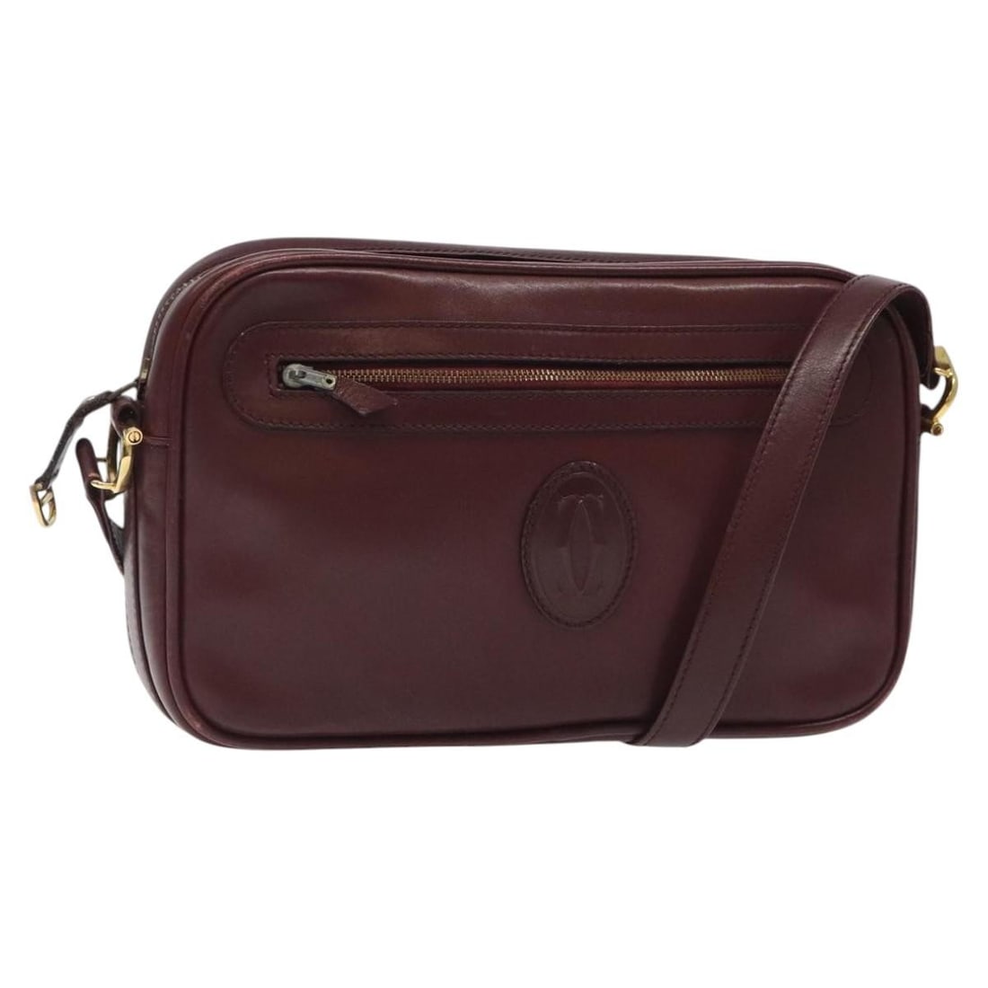 Cartier Must Line Wine Red Leather Shoulder Bag with Dust Bag: Cartier Must Line Wine Red Leather Shoulder Bag with Dust Bag This Cartier Must Line shoulder bag features wine red leather with gold-tone accents. Designed for women, it offers a classic silhouette w