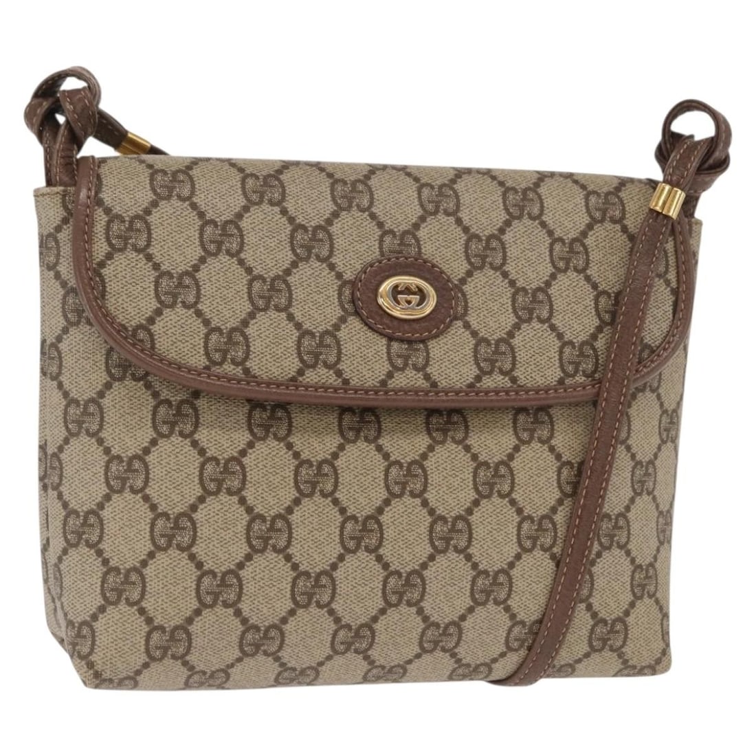 Beige and Gold GG Supreme Shoulder Bag by Gucci Model 007 115 6087: Beige and Gold GG Supreme Shoulder Bag by Gucci Model 007 115 6087 This GUCCI GG Supreme shoulder bag features classic beige and gold tones with the iconic GG canvas and PVC leather exterior. Made in 
