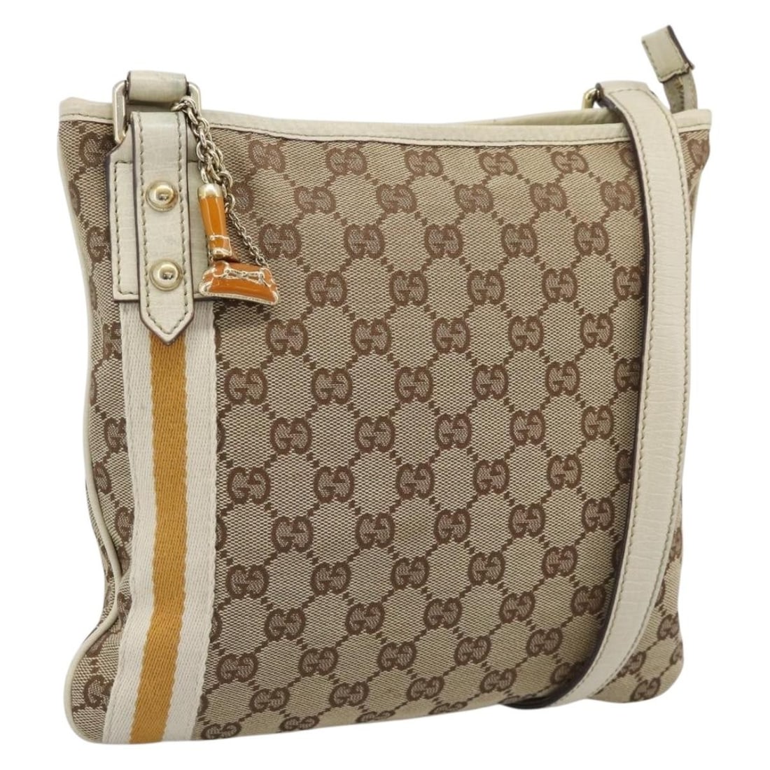 Gucci 144388 GG Canvas Shoulder Bag Beige Gold Charm: Gucci 144388 GG Canvas Shoulder Bag Beige Gold Charm Gucci GG Canvas Sherry Line shoulder bag in beige and gold, made in Italy. It comes with a charm accessory and features GG Canvas exterior material