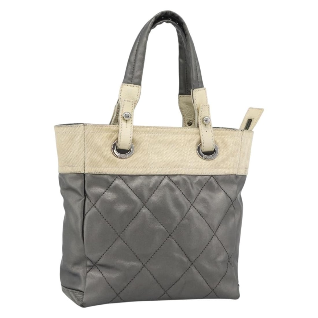 CHANEL Paris Biarritz PM Coated Canvas Silver Tote: CHANEL Paris Biarritz PM Coated Canvas Silver Tote CHANEL Paris Biarritz PM Tote Bag in silver coated canvas, made in Italy. This women's tote bag measures approximately 25 cm W x 26 cm H x 11 cm D, w