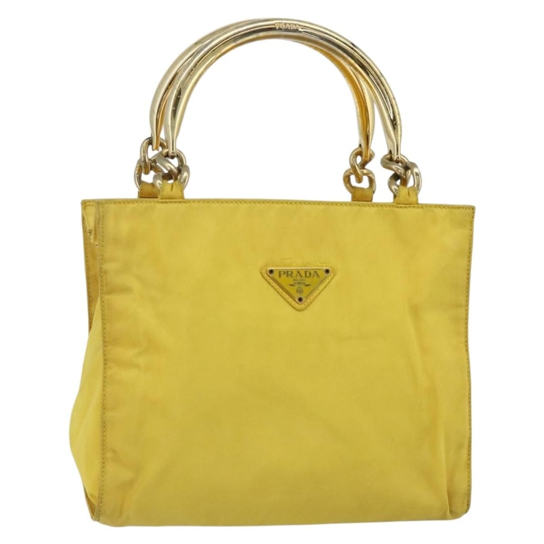 Prada Nylon Handbag in Yellow Gold Made in Italy: Prada Nylon Handbag in Yellow Gold Made in Italy Prada women's handbag in yellow and gold nylon, made in Italy. This pre-owned bag includes only the item shown, with no box or dust bag. Condition is h
