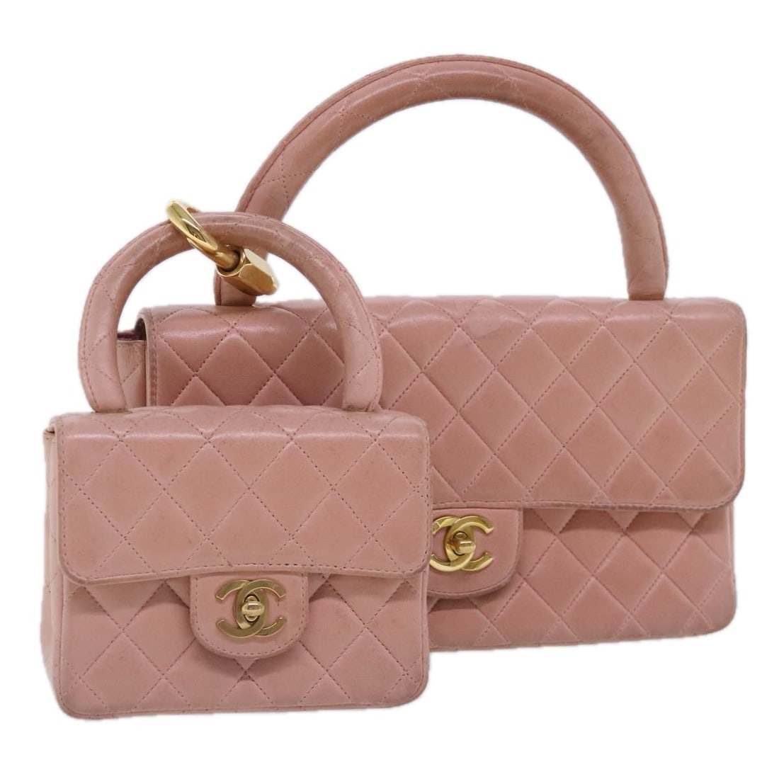 CHANEL Parent Child Lamb Skin Hand Bag Pink Gold France: CHANEL Parent Child Lamb Skin Hand Bag Pink Gold France CHANEL parent-child style hand bag in pink and gold lamb skin, made in France. It features a compact silhouette with a handle and comes with a g