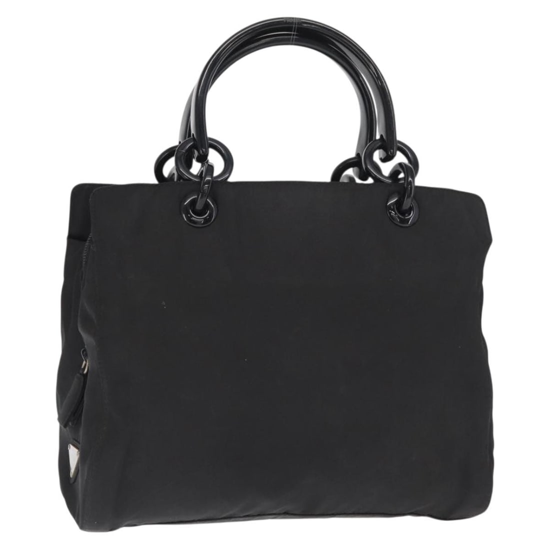 Black Nylon Prada Handbag with Silver Tone Details from Italy: Black Nylon Prada Handbag with Silver Tone Details from Italy This PRADA handbag is crafted from black nylon with silver-tone details, offering a stylish and practical accessory. Made in Italy, the ba