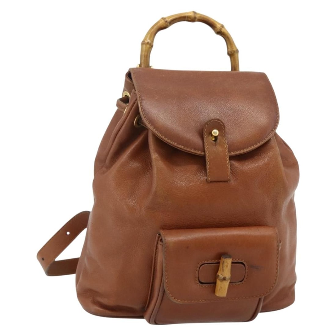 Gucci Bamboo Brown Leather Backpack Italy 003 3444 0030: Gucci Bamboo Brown Leather Backpack Italy 003 3444 0030 This GUCCI Bamboo Backpack is crafted from brown leather with gold-tone accents and features the signature bamboo detail. Designed for women, it