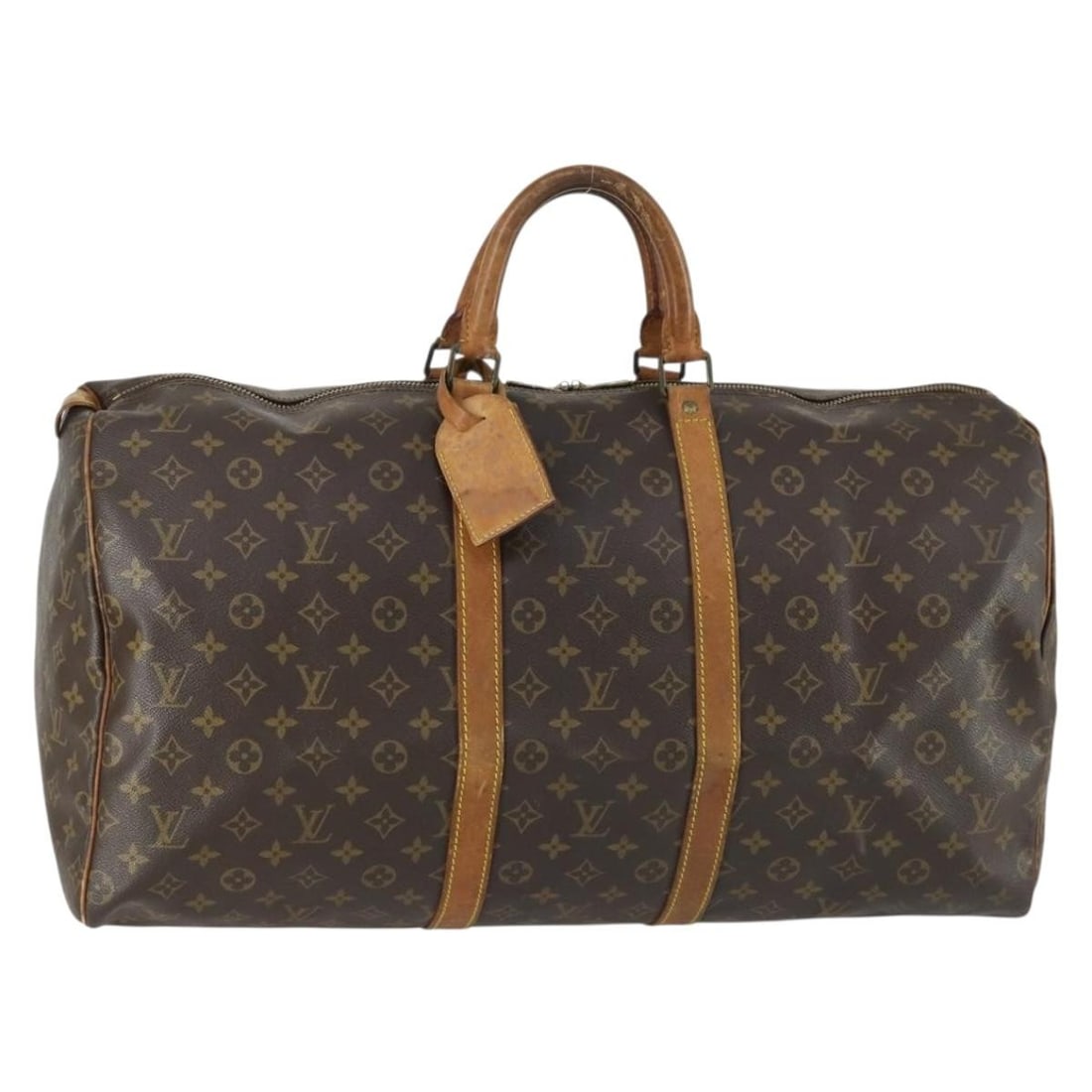 Louis Vuitton M41424 Keepall 55 Monogram Canvas Boston Bag: Louis Vuitton M41424 Keepall 55 Monogram Canvas Boston Bag Louis Vuitton Keepall 55 Boston bag in Monogram canvas with a name tag accessory. This heavily used piece shows visible wear throughout, incl