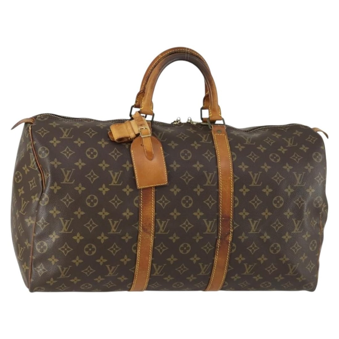 Louis Vuitton M41426 Keepall 50 Monogram Canvas Boston Bag: Louis Vuitton M41426 Keepall 50 Monogram Canvas Boston Bag Louis Vuitton Keepall 50 Boston bag in Monogram canvas, model M41426, made in France. Includes a name tag and Powanie. Condition is heavily u