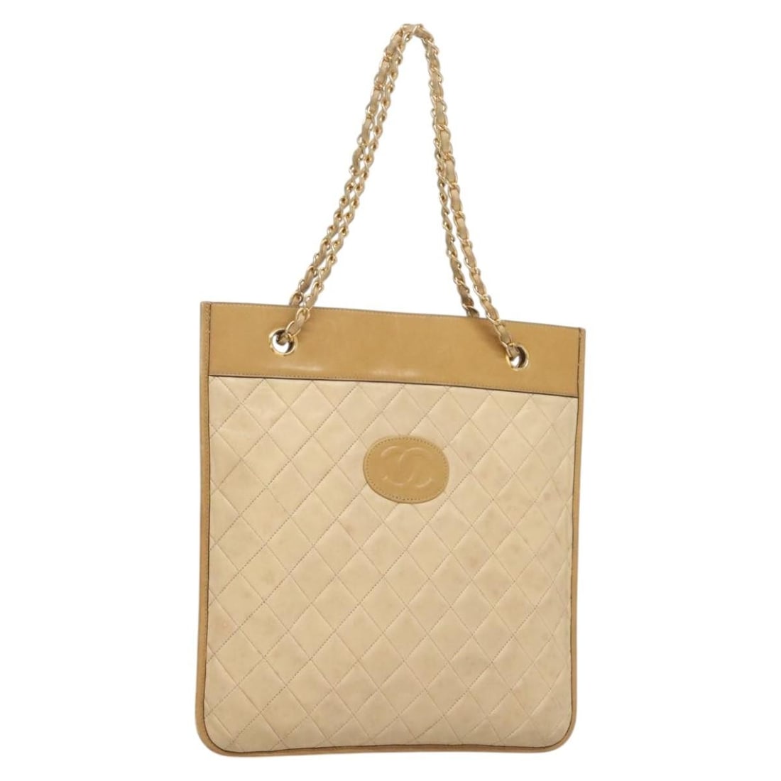 Beige Lamb Skin CHANEL Shoulder Bag with Gold CC Chain: Beige Lamb Skin CHANEL Shoulder Bag with Gold CC Chain A Chanel chain shoulder bag in beige and gold lamb skin, made in France. The bag is a shoulder style and is offered in heavily used condition, wi