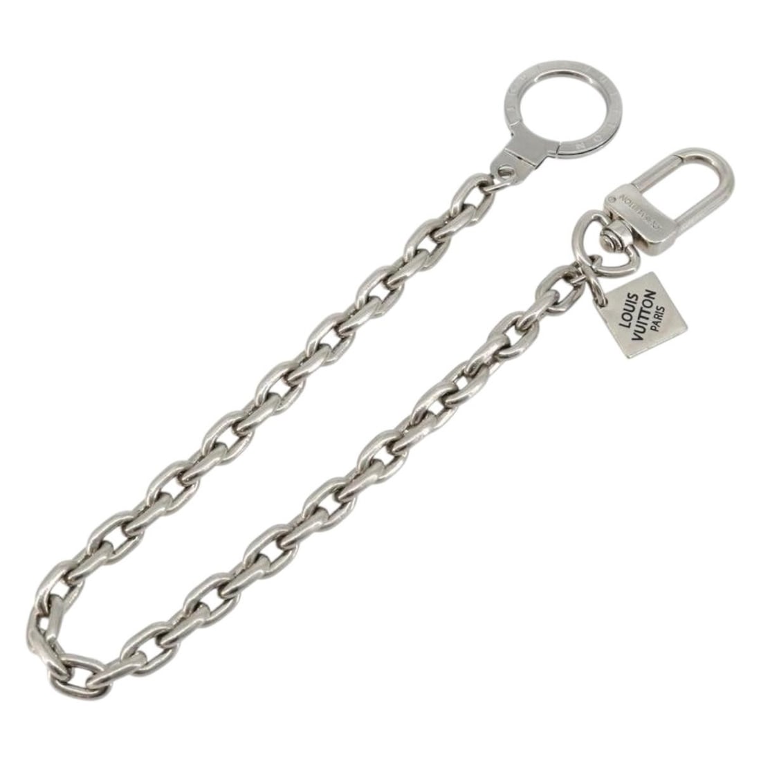 Louis Vuitton M65774 Silver Metal Key Holder Anneau Cles: Louis Vuitton M65774 Silver Metal Key Holder Anneau Cles Louis Vuitton Chainne Anneau Cles key holder in silver-tone metal. This heavily used piece shows surface scratches and has a metal odor. Only t