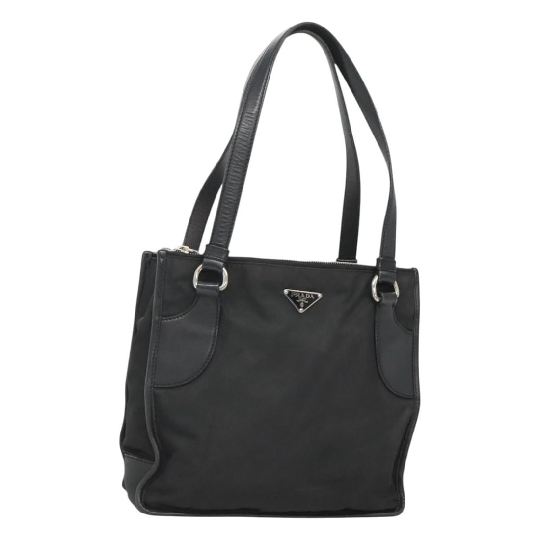 Prada black nylon tote bag Italy silver trim: Prada black nylon tote bag Italy silver trim This PRADA tote bag is crafted from black nylon with silver-tone accents. Designed for women, it features a spacious interior and a practical handle drop f