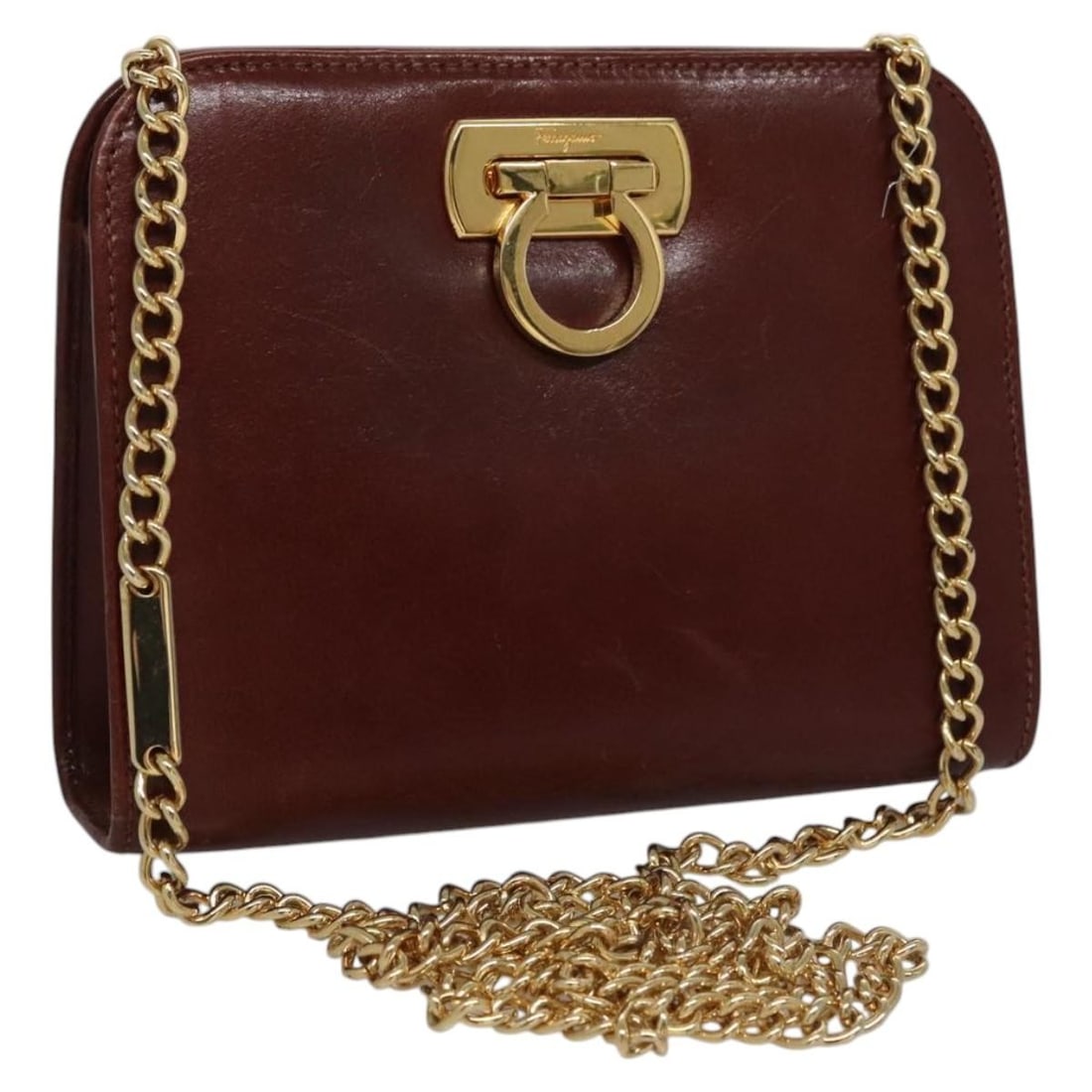 Salvatore Ferragamo Gancini Leather Shoulder Bag Brown Gold Tone: Salvatore Ferragamo Gancini Leather Shoulder Bag Brown Gold Tone Salvatore Ferragamo shoulder bag in brown leather with gold-tone accents. Made in Italy, this compact women's bag features the Chain Ga