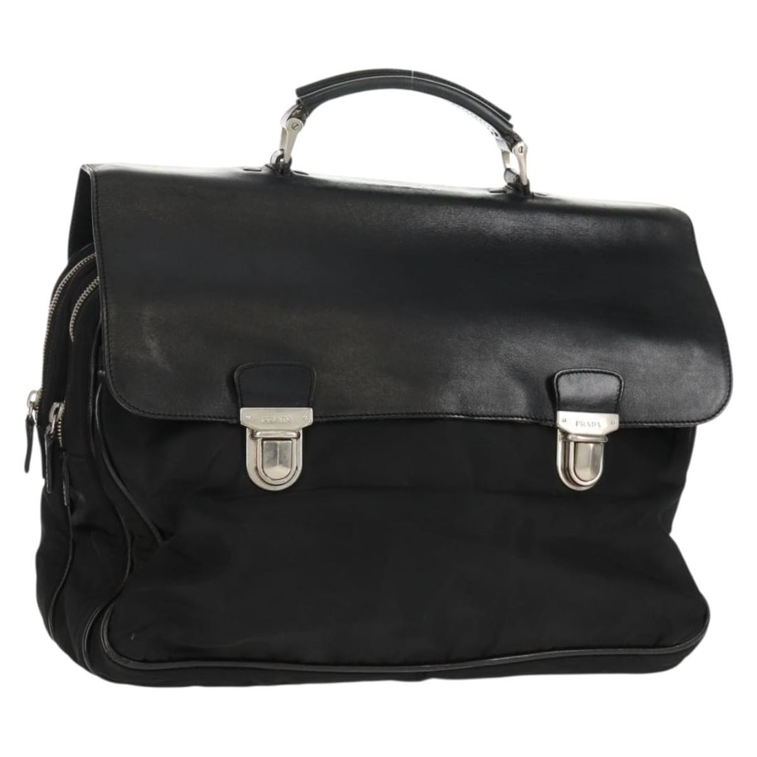 Black and Silver Nylon Leather PRADA Handbag from Italy: Black and Silver Nylon Leather PRADA Handbag from Italy This authentic Prada handbag is crafted from black nylon with leather accents and silver-tone details. Made in Italy, it features a spacious mai
