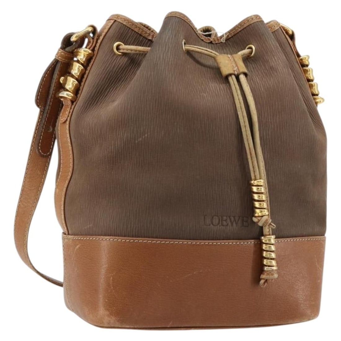 LOEWE Suede Shoulder Bag Brown Gold Tone Italy: LOEWE Suede Shoulder Bag Brown Gold Tone Italy LOEWE shoulder bag in brown suede with gold-tone exterior accents. Made in Italy, this women's bag features a shoulder strap drop of approximately 50 cm 