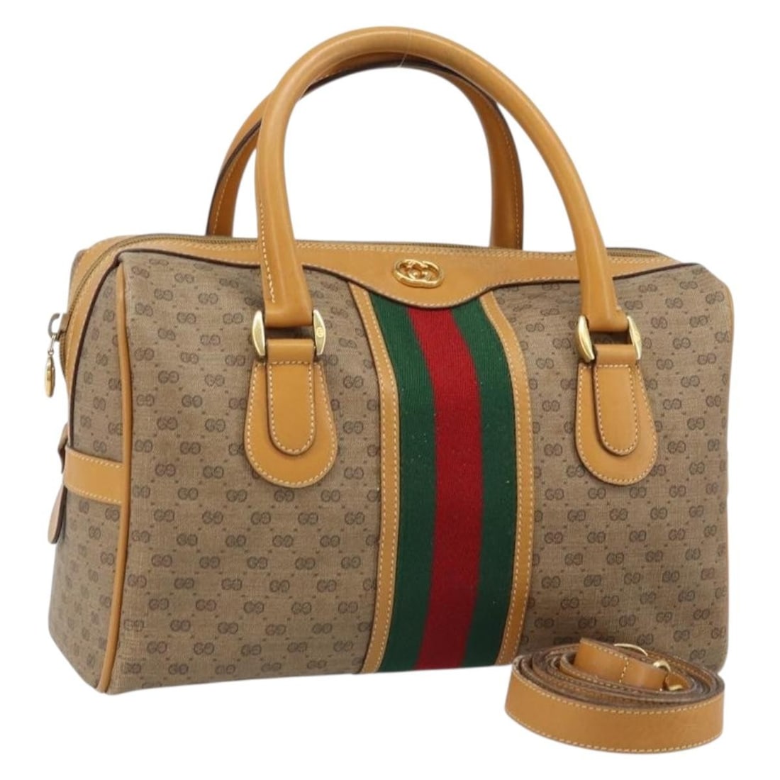 Gucci Micro GG Supreme Boston Bag with Shoulder Strap Italy: Gucci Micro GG Supreme Boston Bag with Shoulder Strap Italy This GUCCI Micro GG Supreme Web Sherry Line Boston Bag is crafted from beige and gold PVC leather with micro small GG canvas accents. It fea