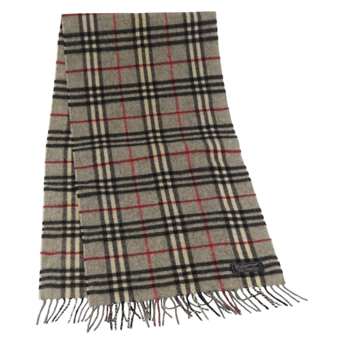 Gray Wool Scarf Nova Check Pattern by Burberrys England: Gray Wool Scarf Nova Check Pattern by Burberrys England This Burberrys Nova Check scarf is crafted from wool in a gray color and features the iconic check pattern. Made in England, it measures approxi