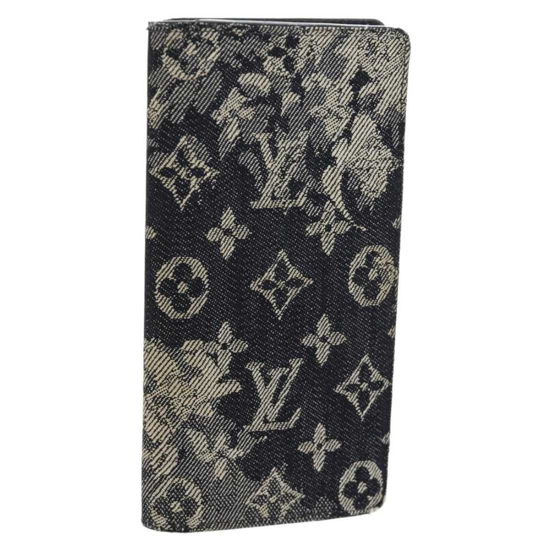 Louis Vuitton M80032 Brazza NM long wallet in navy Monogram Canvas: Louis Vuitton M80032 Brazza NM long wallet in navy Monogram Canvas Louis Vuitton Brazza Portefeuille NM long wallet in navy Monogram canvas. Made in Spain, this wallet includes the dust bag and item b