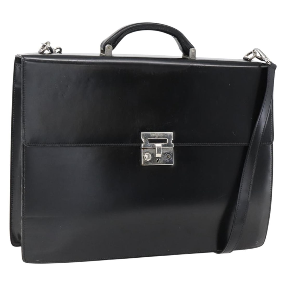 Ferragamo Black Leather Women Business Tote with Strap Dust Bag: Ferragamo Black Leather Women Business Tote with Strap Dust Bag This Salvatore Ferragamo business bag is crafted from black leather with silver-tone accents. Designed for women, it features both a sho