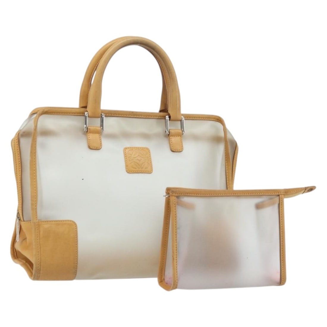 LOEWE Amazona 32 Clear Silver Vinyl Handbag with Pouch: LOEWE Amazona 32 Clear Silver Vinyl Handbag with Pouch LOEWE Amazona 32 clear and silver handbag in vinyl with a pouch accessory. Made in Spain, this women's handbag is a heavily used piece with noted