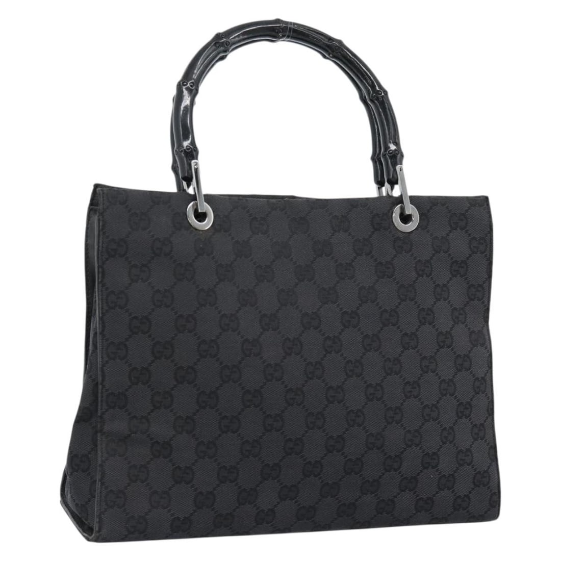 Gucci 002 1016 GG Canvas Handbag with Bamboo Handle Black: Gucci 002 1016 GG Canvas Handbag with Bamboo Handle Black Gucci women's handbag in black GG canvas with silver-tone detailing. Made in Italy, this bag features a bamboo handle design and comes only wi