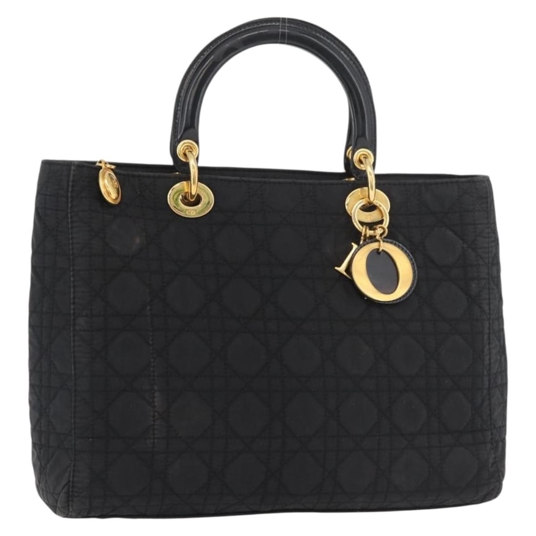 Christian Dior Lady Dior nylon black gold handbag with charm: Christian Dior Lady Dior nylon black gold handbag with charm This Christian Dior Canage Lady Dior handbag is crafted from black nylon with gold-tone accents. Designed for women, it features a structur