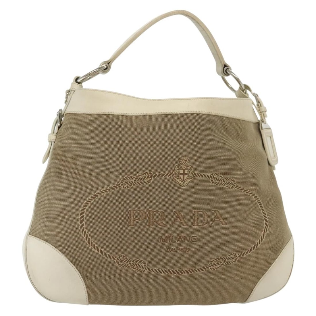 PRADA Canvas Shoulder Bag Beige Silver Made in Italy: PRADA Canvas Shoulder Bag Beige Silver Made in Italy Authentic Prada shoulder bag in beige and silver canvas, made in Italy. This women's bag includes a shoulder strap and guarantee card. Condition is