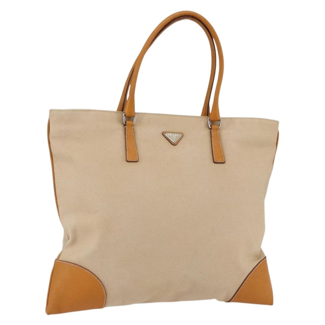 Prada Beige Canvas Handbag Silver Tone Made in Italy: Prada Beige Canvas Handbag Silver Tone Made in Italy Beige and silver Prada handbag made of canvas, crafted in Italy. It measures approximately 40 cm wide by 32 cm high, with a handle drop of about 17