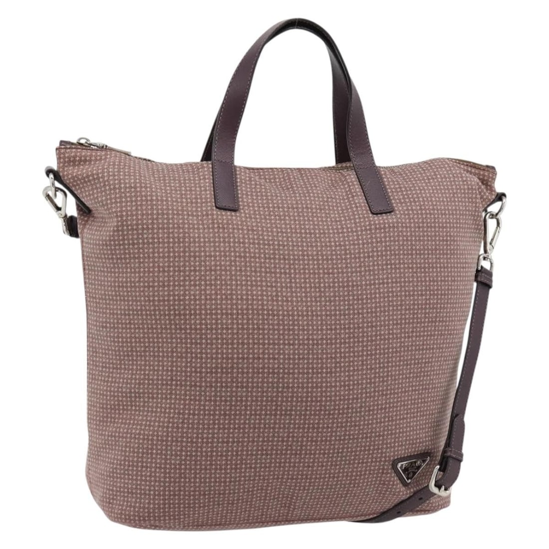 PRADA Red Canvas 2 Way Handbag with Shoulder Strap Silver Tone: PRADA Red Canvas 2 Way Handbag with Shoulder Strap Silver Tone Prada hand bag in canvas with a red and silver color scheme, designed for women and made in Italy. It includes a shoulder strap and offer
