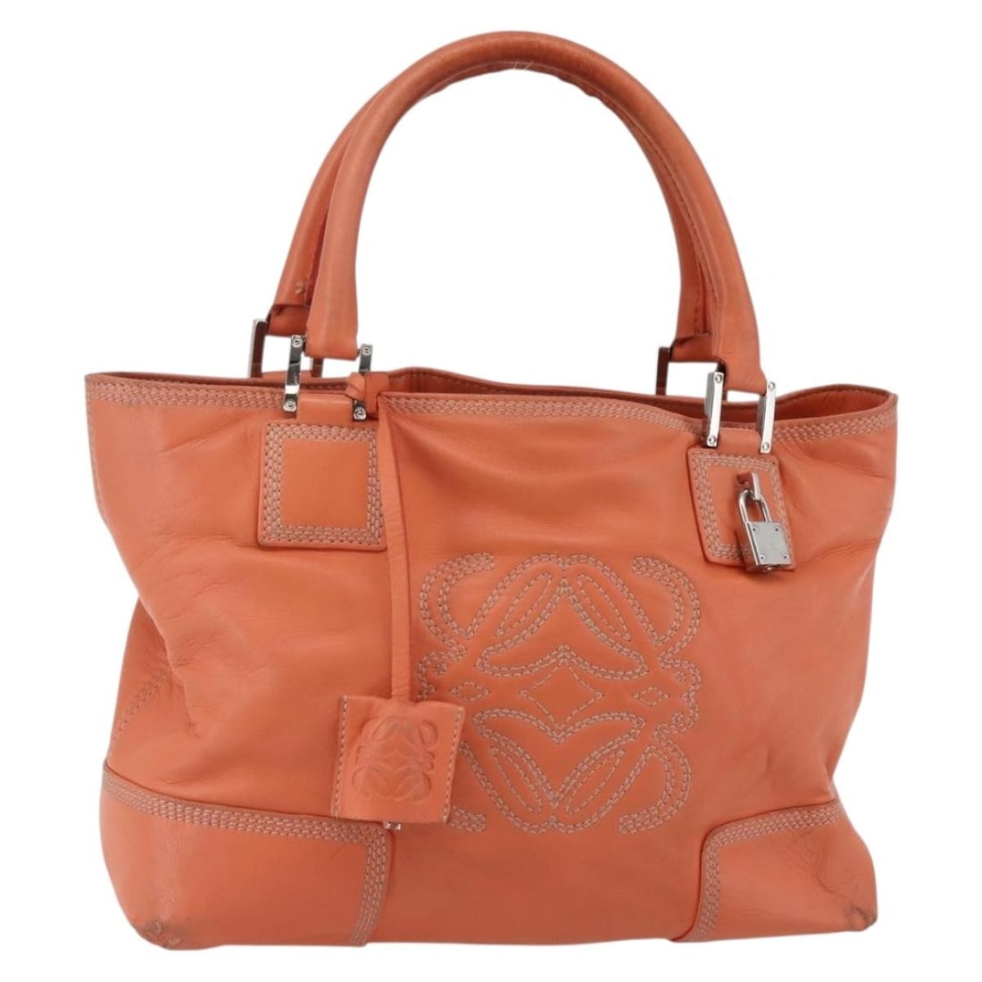 LOEWE Anagram Amazona Justa Leather Hand Bag Orange Silver Auth: LOEWE Anagram Amazona Justa Leather Hand Bag Orange Silver Auth Introducing the LOEWE Anagram Amazona Justa Hand Bag, a stunning blend of style and practicality. Crafted in Spain, this hand bag featur