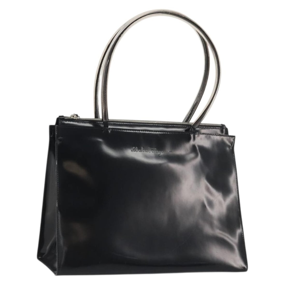 Salvatore Ferragamo Black Silver Leather Tote Bag Italy: Salvatore Ferragamo Black Silver Leather Tote Bag Italy This Salvatore Ferragamo tote bag is crafted from black and silver leather and made in Italy. The bag features a spacious interior, dual handles