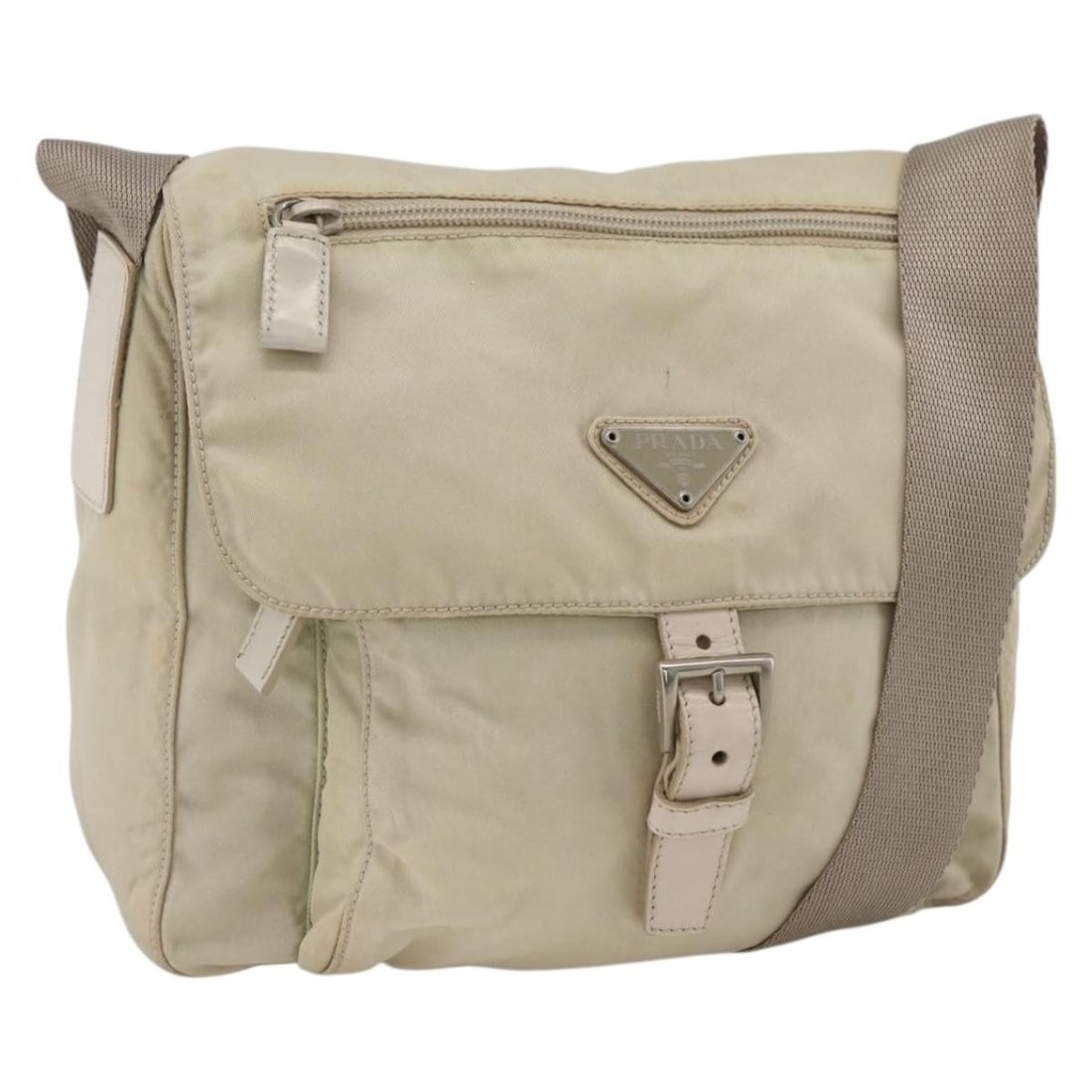 Prada Beige Nylon Shoulder Bag with Silver Tone Accents and Guarantee Card: Prada Beige Nylon Shoulder Bag with Silver Tone Accents and Guarantee Card This PRADA shoulder bag is crafted from beige nylon with silver-tone accents, designed for women. It features a practical adj