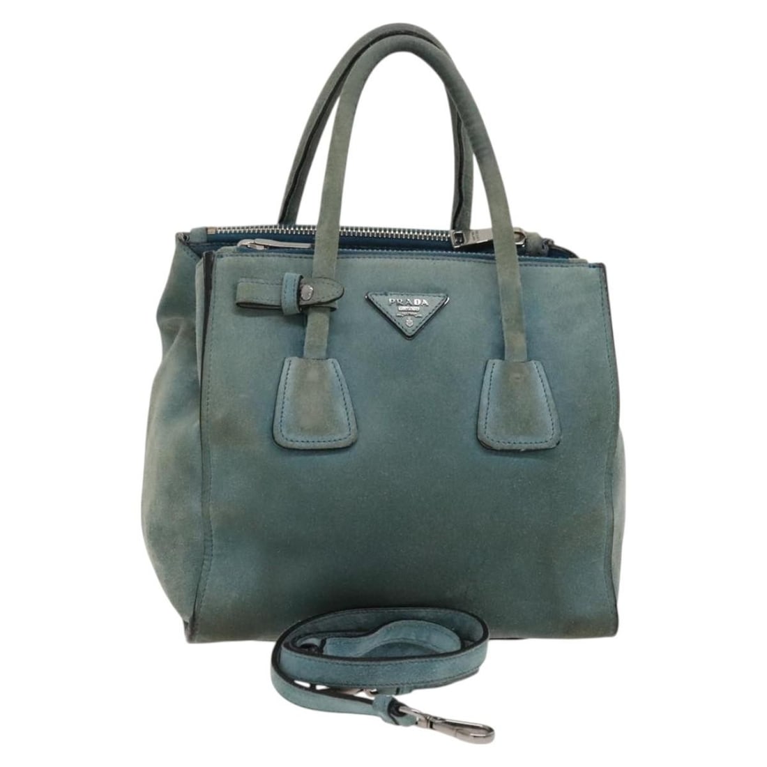 Prada blue suede shoulder bag with strap Italy: Prada blue suede shoulder bag with strap Italy This PRADA handbag is crafted from blue and silver suede and offers versatile carrying options with both a top handle and a detachable shoulder strap. Ma
