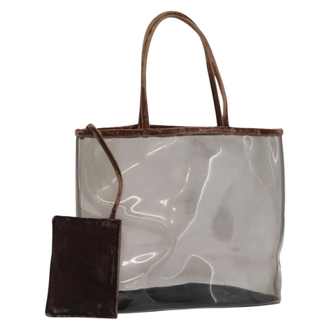 Prada brown velour tote with pouch Italy: Prada brown velour tote with pouch Italy This PRADA tote bag is crafted from velour in a brown hue, offering a soft texture and a stylish look. The bag features a spacious interior and comes with a po