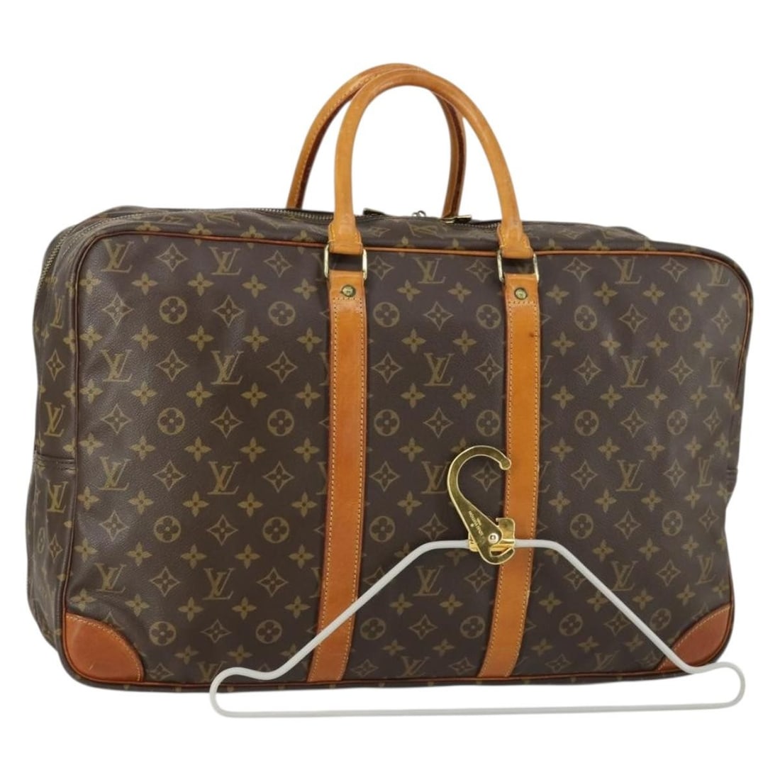 Louis Vuitton M41404 Sirius 55 Monogram Canvas Boston Bag: Louis Vuitton M41404 Sirius 55 Monogram Canvas Boston Bag Louis Vuitton Sirius 55 Boston bag in Monogram canvas, made in France. This women's travel bag is offered as the bag only, with no box or dust