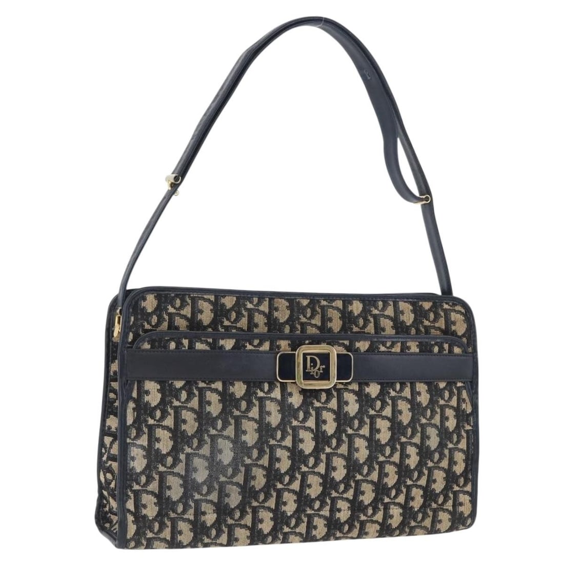 Navy Trotter Canvas Shoulder Bag by Christian Dior Gold Accents: Navy Trotter Canvas Shoulder Bag by Christian Dior Gold Accents This Christian Dior Trotter Canvas shoulder bag features a navy and gold color scheme. Crafted in France, the bag is made from signature