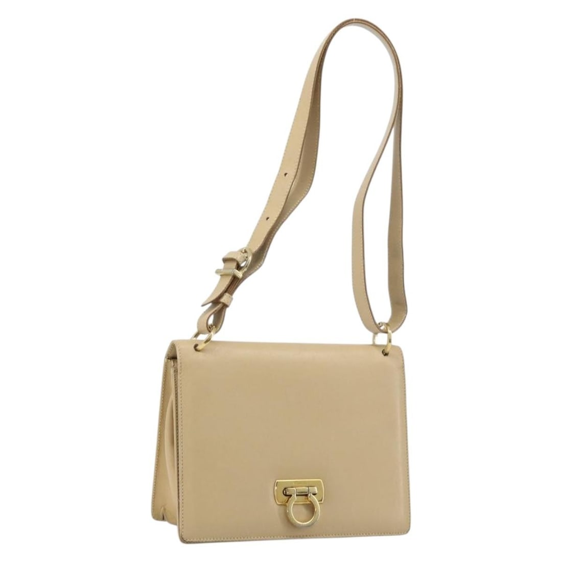 Beige Leather Gancini Shoulder Bag by Salvatore Ferragamo Italy Gold Accents: Beige Leather Gancini Shoulder Bag by Salvatore Ferragamo Italy Gold Accents This Salvatore Ferragamo Gancini shoulder bag is crafted from beige leather with gold-tone accents. Designed for women, it 