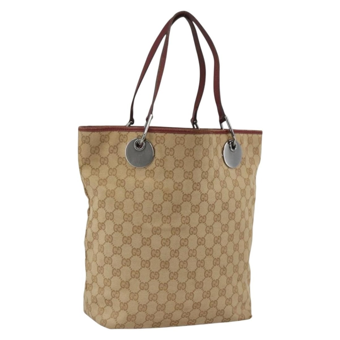 Gucci Beige Silver GG Canvas Tote 120836 Italy: Gucci Beige Silver GG Canvas Tote 120836 Italy This GUCCI GG Canvas Tote Bag features a beige and silver color scheme and is crafted from signature GG canvas material. Designed for women, the bag is m