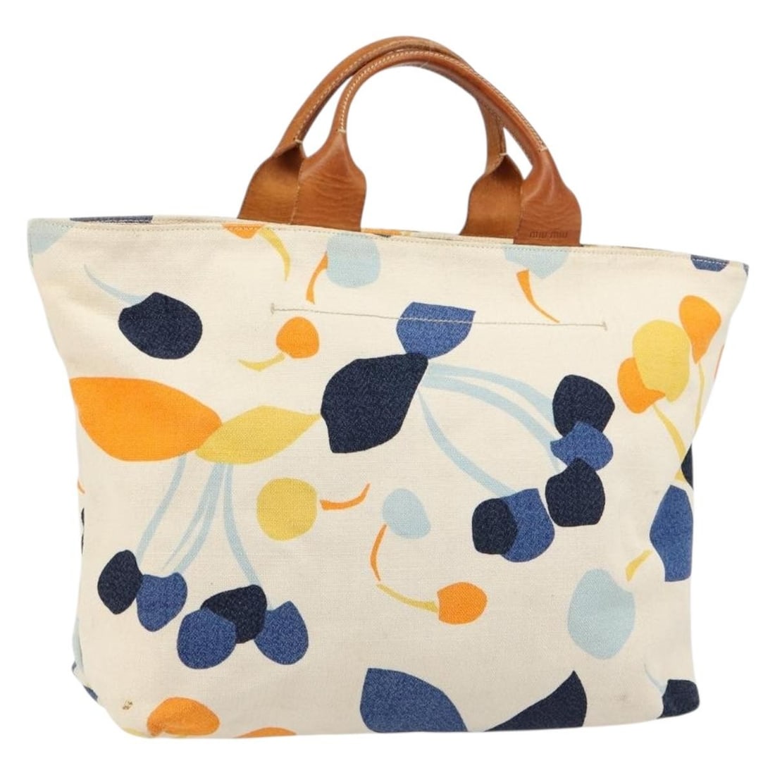 Miu Miu Canvas Hand Bag White Gold Italy: Miu Miu Canvas Hand Bag White Gold Italy Miu Miu canvas handbag in white and gold, made in Italy. The bag is a heavily used style with visible wear throughout, including loss of shape, rubbing, stains