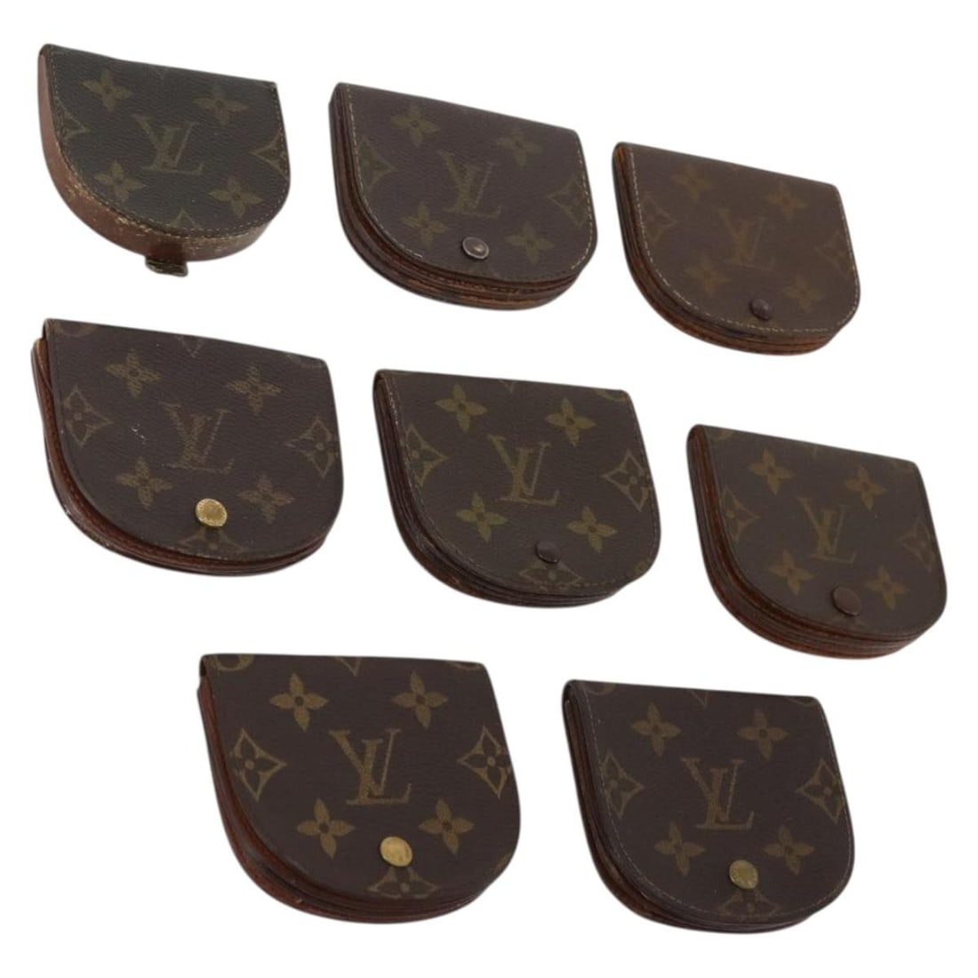 8 Piece Louis Vuitton Monogram Canvas Wallet Bundle: 8 Piece Louis Vuitton Monogram Canvas Wallet Bundle Louis Vuitton monogram canvas wallet in monogram color, made in France and designed for women. This item is offered as a wallet and is described as 