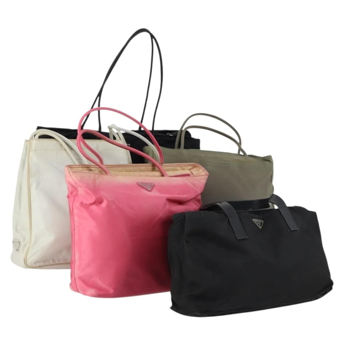 Prada Nylon Black White Pink Hand Bag with Guarantee Card: Prada Nylon Black White Pink Hand Bag with Guarantee Card This set includes five PRADA handbags crafted from nylon in black, white, and pink. Designed for women, each bag features the classic PRADA st