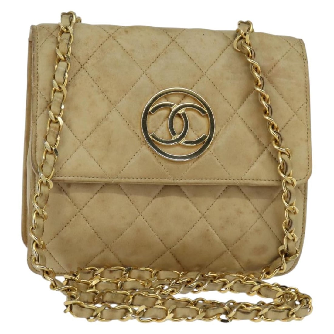 Chanel CC Beige Lambskin Shoulder Bag with Gold Chain: Chanel CC Beige Lambskin Shoulder Bag with Gold Chain CHANEL Matelasse chain shoulder bag in beige lamb skin with gold-tone CC details. Made in Italy, this shoulder bag measures approximately 17 cm W 
