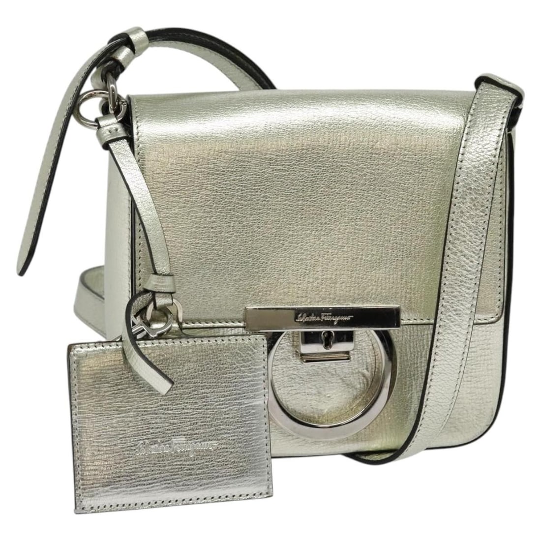 Salvatore Ferragamo Gancini leather shoulder bag with mirror: Salvatore Ferragamo Gancini leather shoulder bag with mirror This Salvatore Ferragamo Gancini shoulder bag is crafted from leather in a champagne gold and silver color combination. Designed for women,