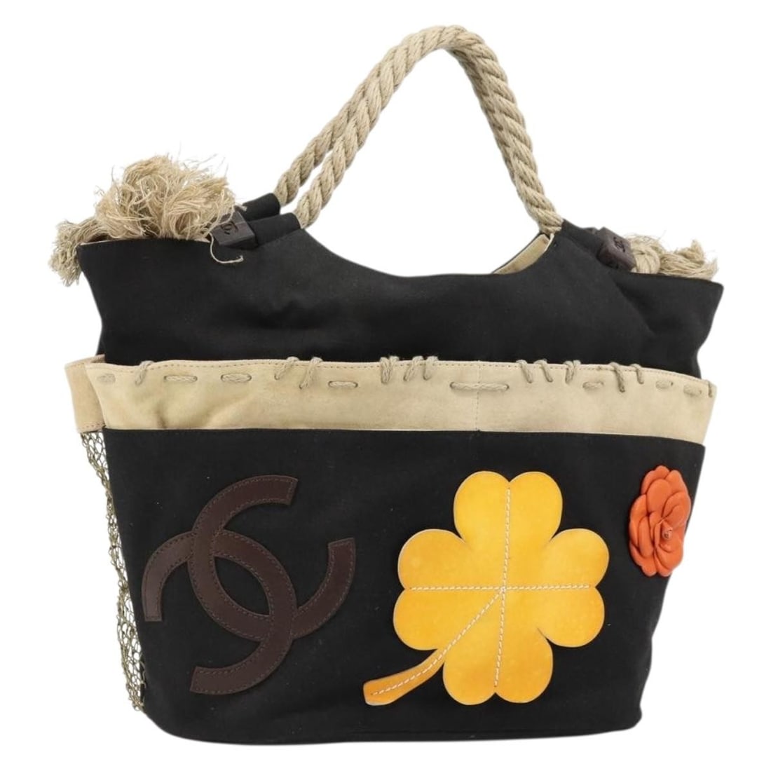 Black Canvas Tote Bag by CHANEL with Silver CC: Black Canvas Tote Bag by CHANEL with Silver CC Black and silver CHANEL tote bag made of canvas, made in Italy. The bag measures approximately 30 cm W x 27 cm H x 13 cm D, with a handle drop of approxi