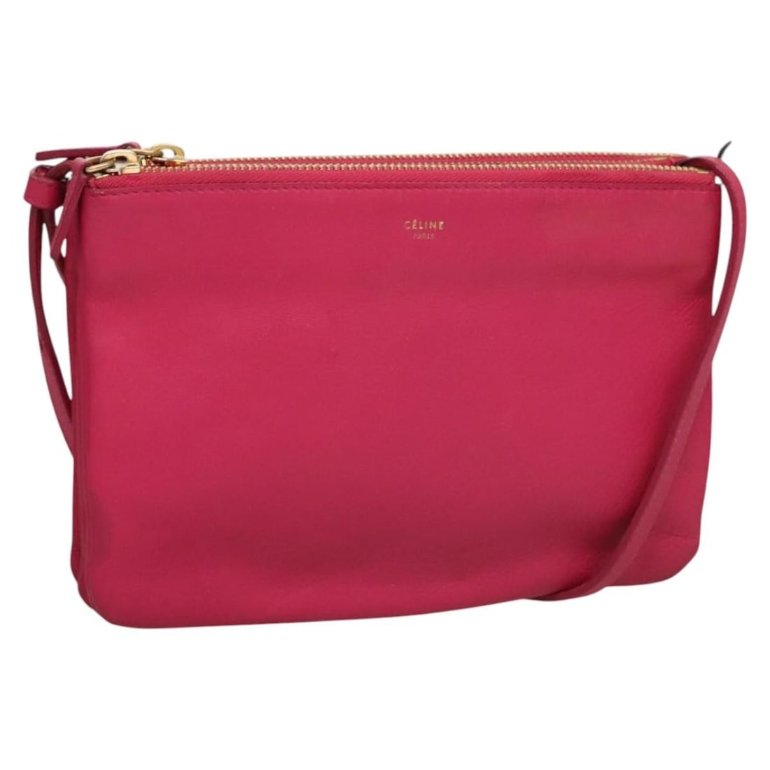 Celine Trio Leather Shoulder Bag Pink with Gold Tone Hardware: Celine Trio Leather Shoulder Bag Pink with Gold Tone Hardware A CELINE Trio shoulder bag in pink leather with gold-tone hardware. Made in Italy, it features a compact profile and comes with the should
